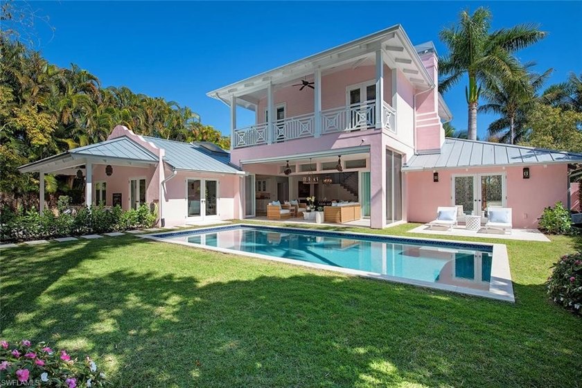 The *Pink House* is a rare and captivating offering, blending - Beach Home for sale in Naples, Florida on Beachhouse.com
