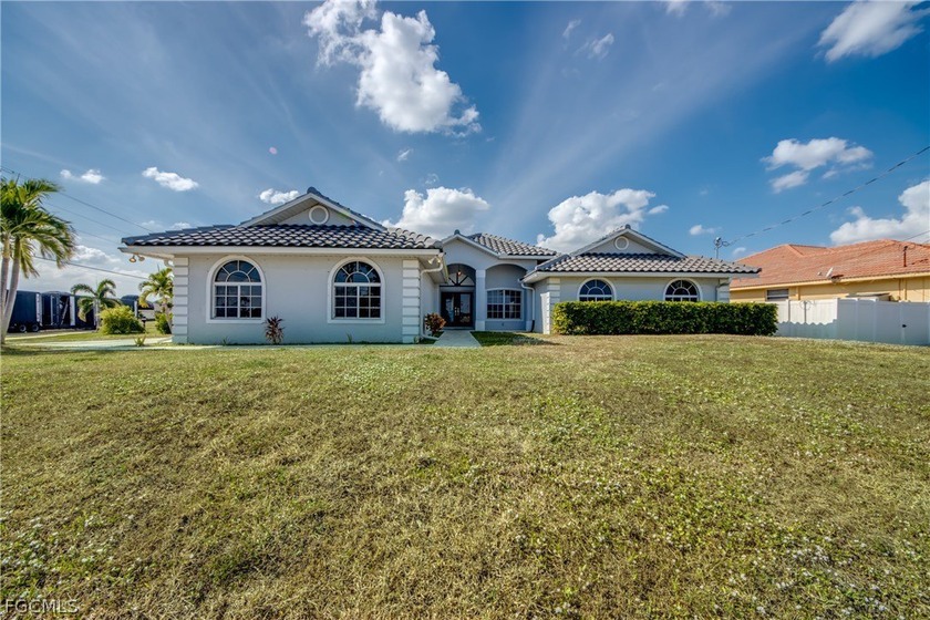 This well-maintained 3-bedroom, 2.5-bath home with a spacious - Beach Home for sale in Cape Coral, Florida on Beachhouse.com