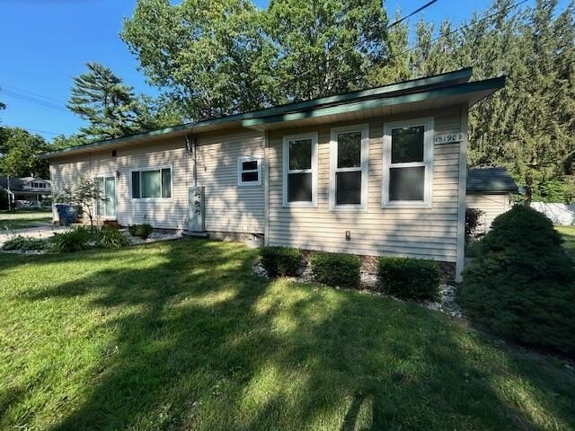This exceptionally well-maintained triplex offers a solid - Beach Home for sale in Spring Lake, Michigan on Beachhouse.com