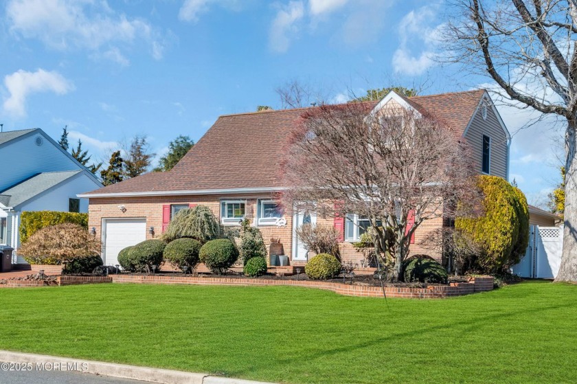 Welcome Home! This fantastic Cape Cod home accented with a brick - Beach Home for sale in Manahawkin, New Jersey on Beachhouse.com