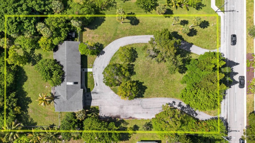 Expansive 1.22-Acre Property with Endless Possibilities in - Beach Home for sale in Tamarac, Florida on Beachhouse.com