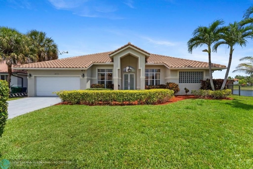 Welcome to this stunning home in the gated Carriage Pointe - Beach Home for sale in Coral Springs, Florida on Beachhouse.com