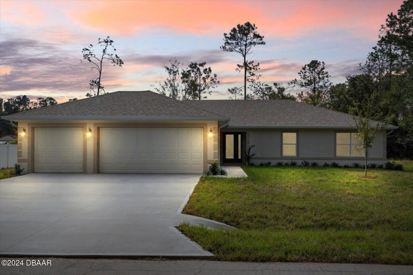 Discover this beautifully crafted New Construction home - Beach Home for sale in Palm Coast, Florida on Beachhouse.com