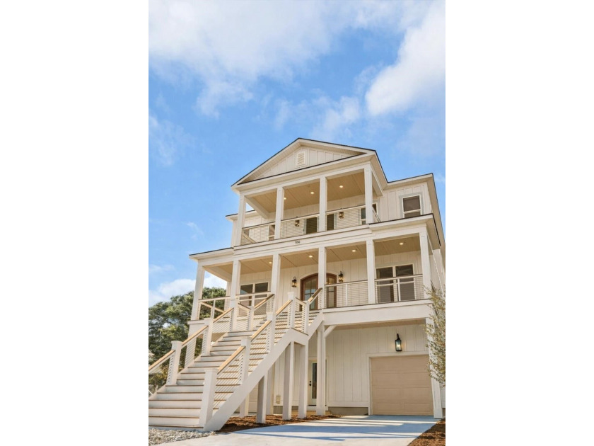 Welcome to this stunning brand-new 3-story beach house, with - Beach Home for sale in North Myrtle Beach, South Carolina on Beachhouse.com