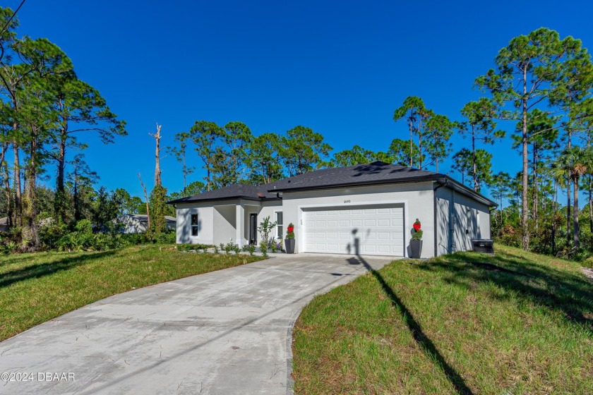 CUSTOM BUILT BRAND NEW NEVER LIVED IN CONCRETE BLOCK HOME ON A - Beach Home for sale in New Smyrna Beach, Florida on Beachhouse.com