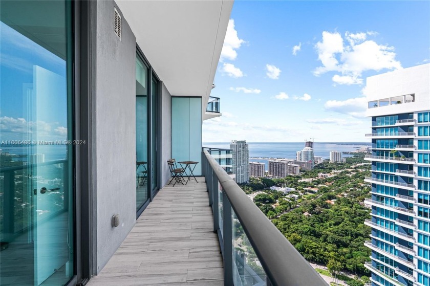 Exceptional PENTHOUSE LEVEL residence featuring 2 PARKING SPACES - Beach Condo for sale in Miami, Florida on Beachhouse.com