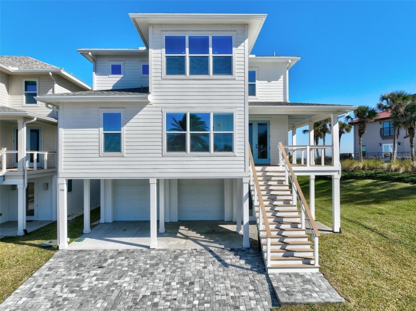 This stunning 6-bedroom, 5.5-bathroom oceanfront residence - Beach Home for sale in Palm Coast, Florida on Beachhouse.com