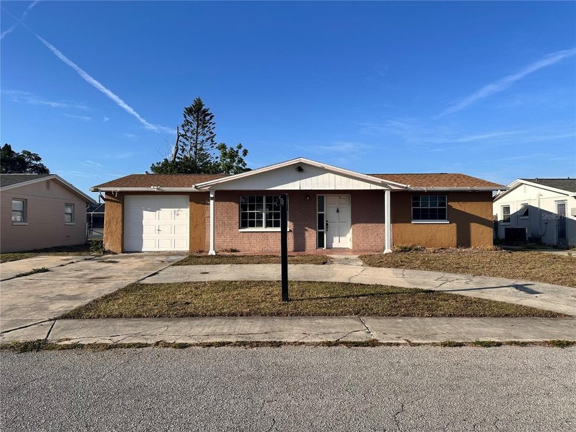 Owner financing! Welcome to 3215 Bright Dr. in Holiday, a solid - Beach Home for sale in Holiday, Florida on Beachhouse.com