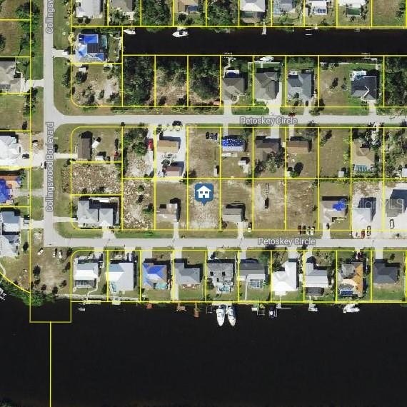 Discover the perfect location to build your dream home on this - Beach Lot for sale in Port Charlotte, Florida on Beachhouse.com