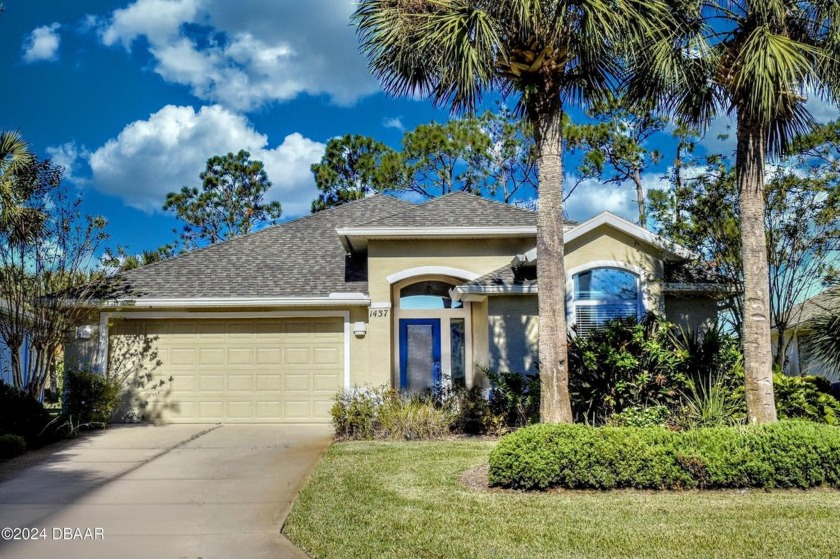 Welcome to your next haven with a scenic backyard view of the - Beach Home for sale in Ormond Beach, Florida on Beachhouse.com