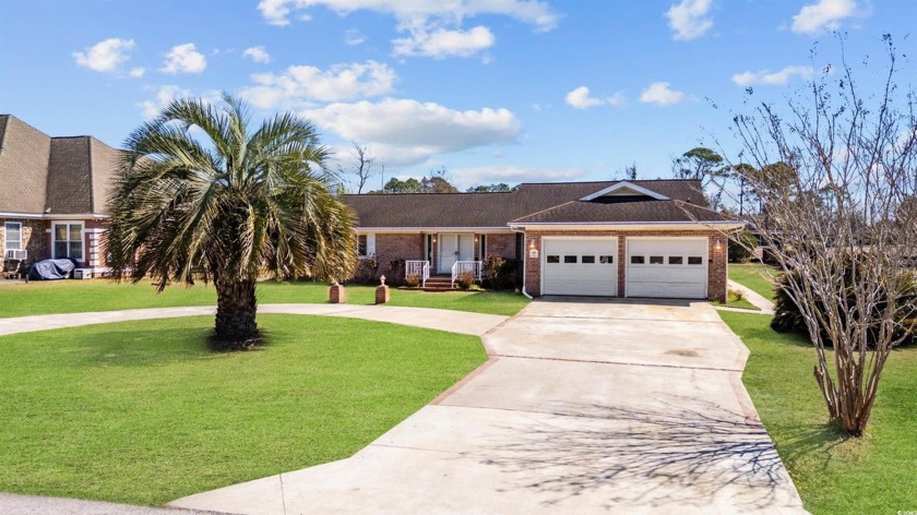 Stunning All-Brick Home with Exceptional Curb Appeal in - Beach Home for sale in Surfside Beach, South Carolina on Beachhouse.com