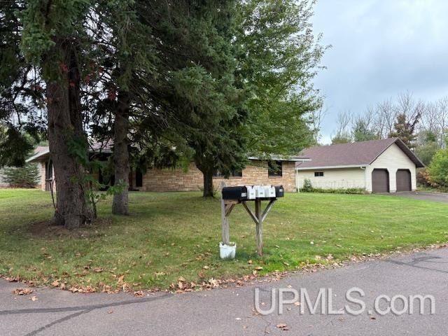 RETRO STONE RANCH ON 5+ LOTS! This 2 bedroom home features - Beach Home for sale in Ironwood, Michigan on Beachhouse.com