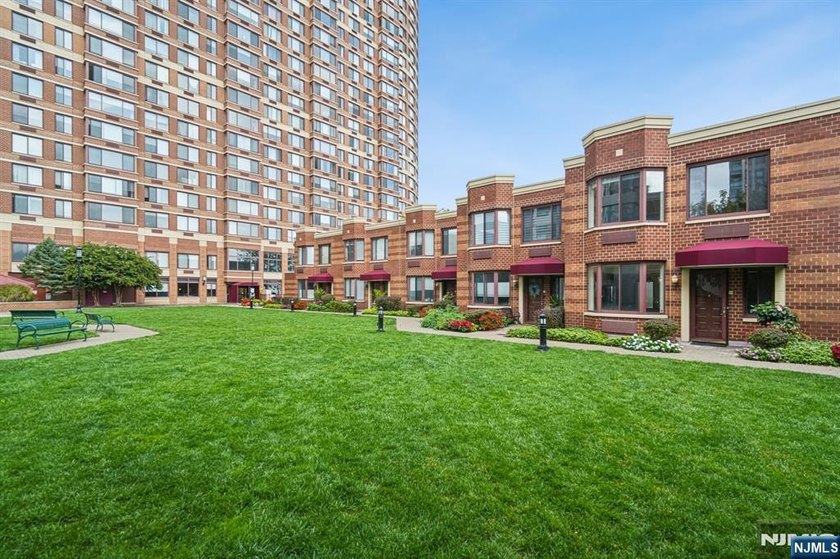 Welcome to luxury two-level townhome living at 100 Old Palisade - Beach Home for sale in Fort Lee, New Jersey on Beachhouse.com