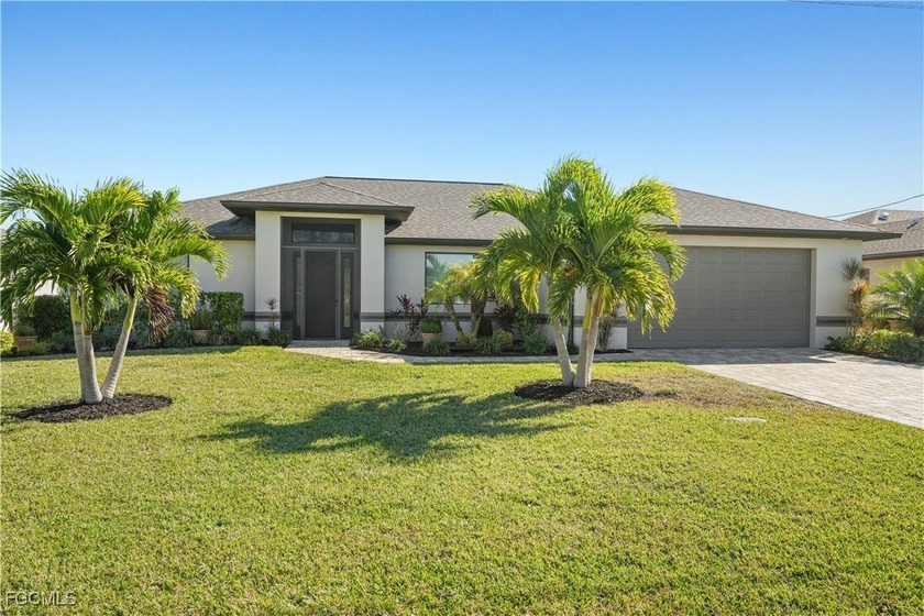 ENJOY SUNRISES OVER SEA BREEZE LAKE. ASSESSMENTS ARE PAID on - Beach Home for sale in Cape Coral, Florida on Beachhouse.com