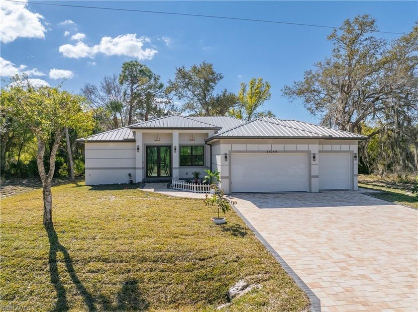 This stunning new construction residence offers 3 bedrooms, 2 - Beach Home for sale in Punta Gorda, Florida on Beachhouse.com
