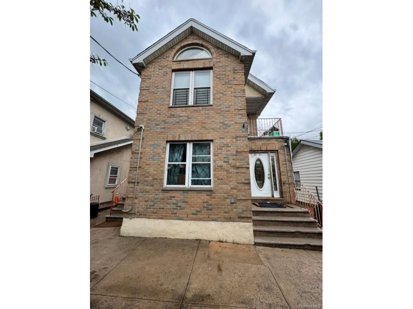 Welcome to this well-maintained detached single-family home in - Beach Home for sale in East Elmhurst, New York on Beachhouse.com