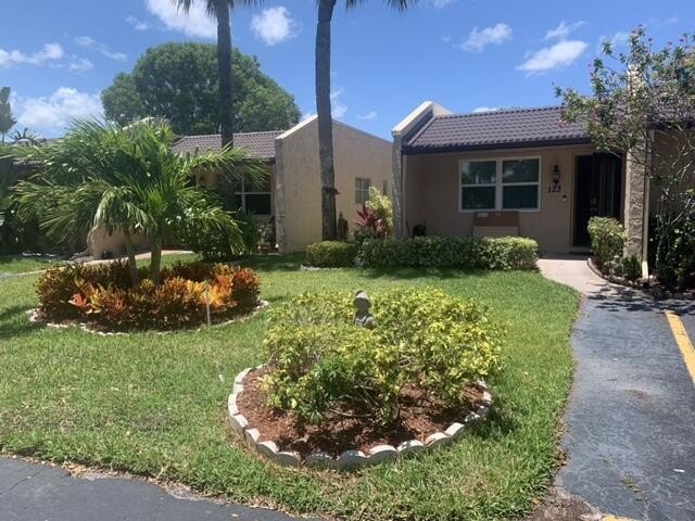 BEAUTIFUL ,SPACIOUS 2/2 VILLA TOTALLY UPDATED CEILING TO FLOOR - Beach Home for sale in West Palm Beach, Florida on Beachhouse.com