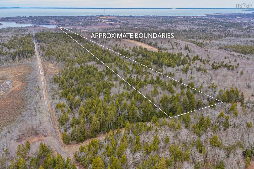 This 11.77 acre property offers a great location with direct - Beach Acreage for sale in Meteghan, Nova Scotia on Beachhouse.com