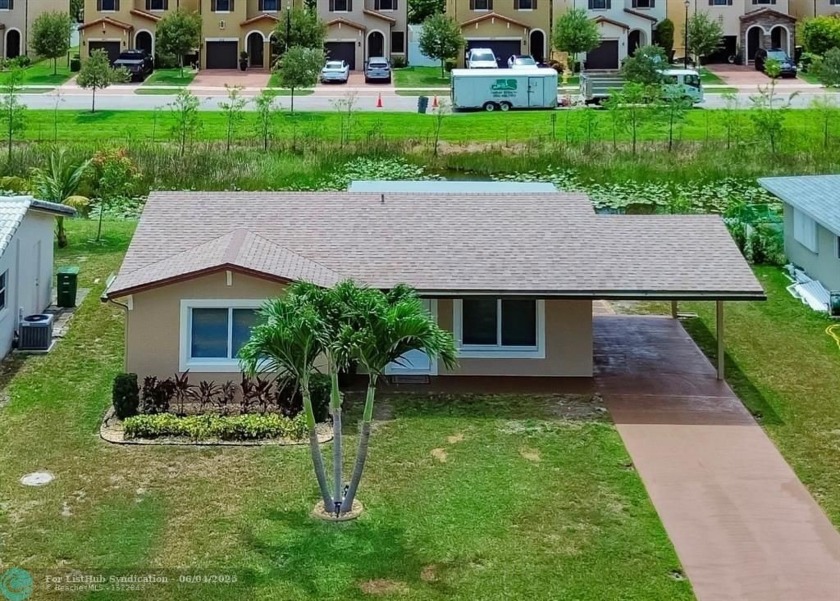 Come discover this truly turnkey, completely renovated - Beach Home for sale in Tamarac, Florida on Beachhouse.com