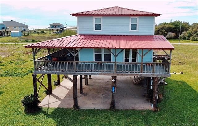 Embrace coastal living with this charming Rustic Beach Cottage - Beach Home for sale in Cameron, Louisiana on Beachhouse.com