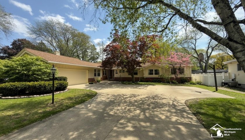 Welcome to this spacious and inviting five-bedroom ranch - Beach Home for sale in Monroe, Michigan on Beachhouse.com