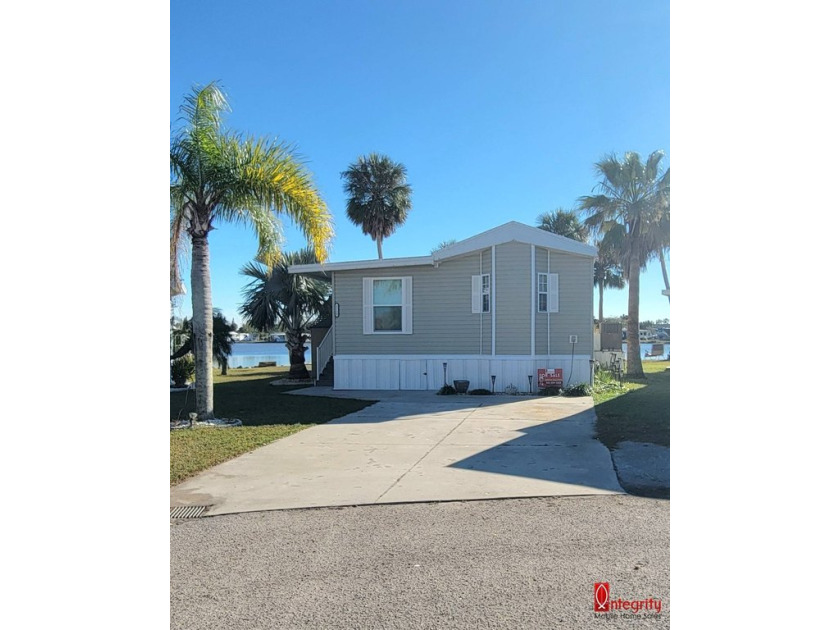 Turnkey Waterfront Gem with Stunning Lake Views    Step into - Beach Home for sale in Bradenton, Florida on Beachhouse.com