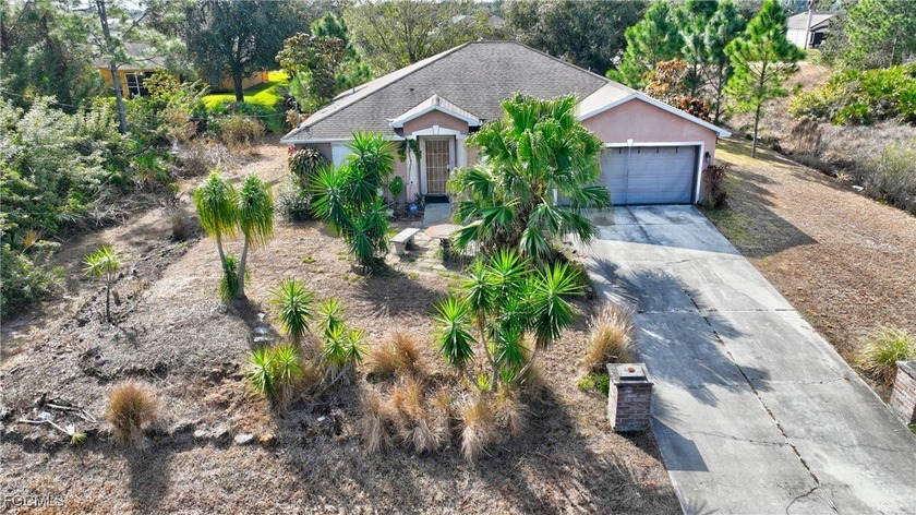 Your search is over! Check out this 4-bedroom, 2 bath home with - Beach Home for sale in Lehigh Acres, Florida on Beachhouse.com