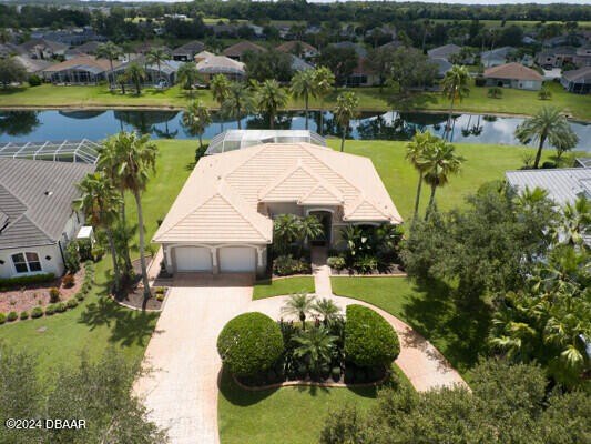 Prime location in the Spruce Creek Fly In Community... This 3 - Beach Home for sale in Port Orange, Florida on Beachhouse.com