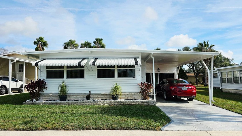 If you're looking for a beautiful 55+ Resort style, pet friendly - Beach Home for sale in Largo, Florida on Beachhouse.com