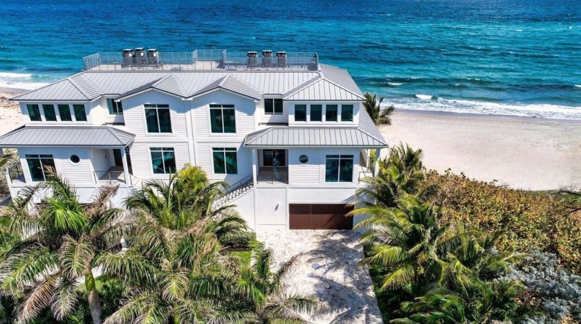 Ocean Ridge townhome, perched directly on the sand, showcases a - Beach Townhome/Townhouse for sale in Ocean Ridge, Florida on Beachhouse.com