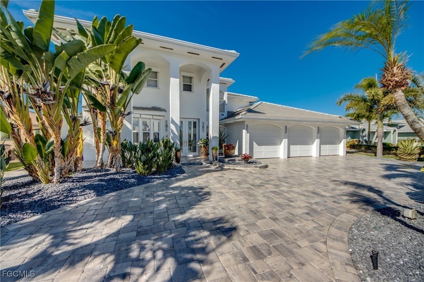 Completely remodeled and move-in ready, this stunning two-story - Beach Home for sale in Cape Coral, Florida on Beachhouse.com