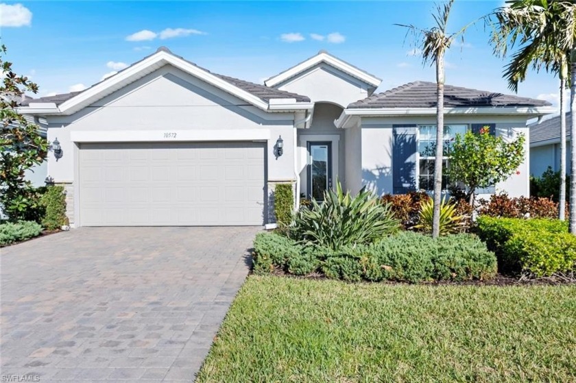 This highly sought after Summerwood floor plan by Pulte sits on - Beach Home for sale in Estero, Florida on Beachhouse.com