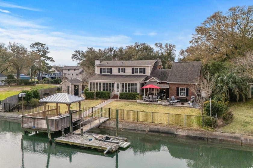 Welcome to 288 Rum Gully Road, a stunning all-brick waterfront - Beach Home for sale in Murrells Inlet, South Carolina on Beachhouse.com