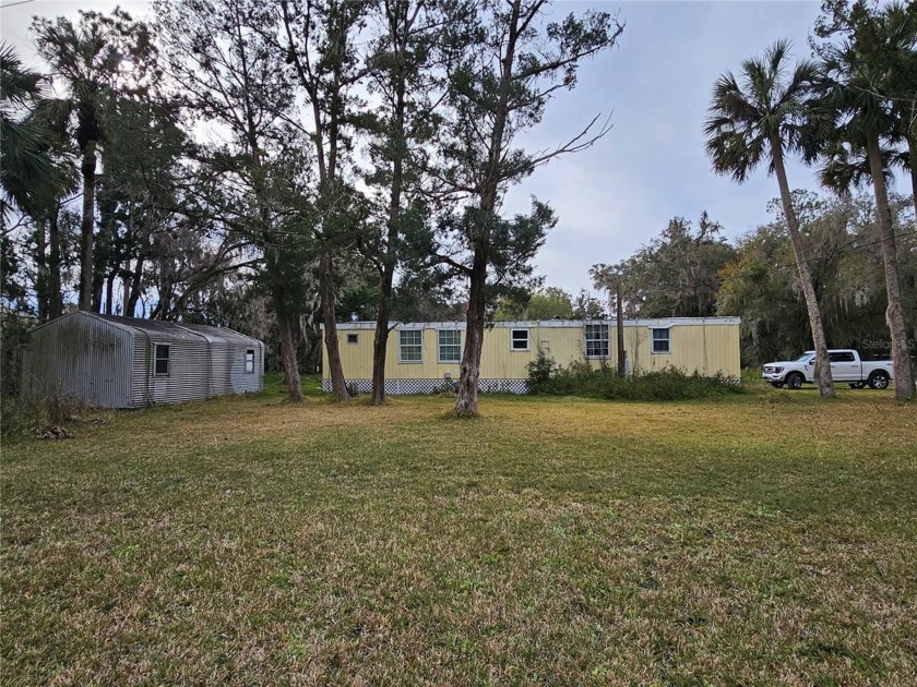 This manufactured home is located .3 miles from Bull Creek Fish - Beach Home for sale in Bunnell, Florida on Beachhouse.com