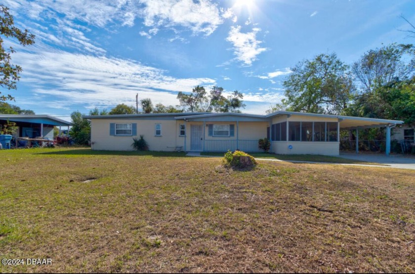 Come see this beautiful 3-bedroom 1 1/2 -bathroom home. Nestled - Beach Home for sale in Daytona Beach, Florida on Beachhouse.com