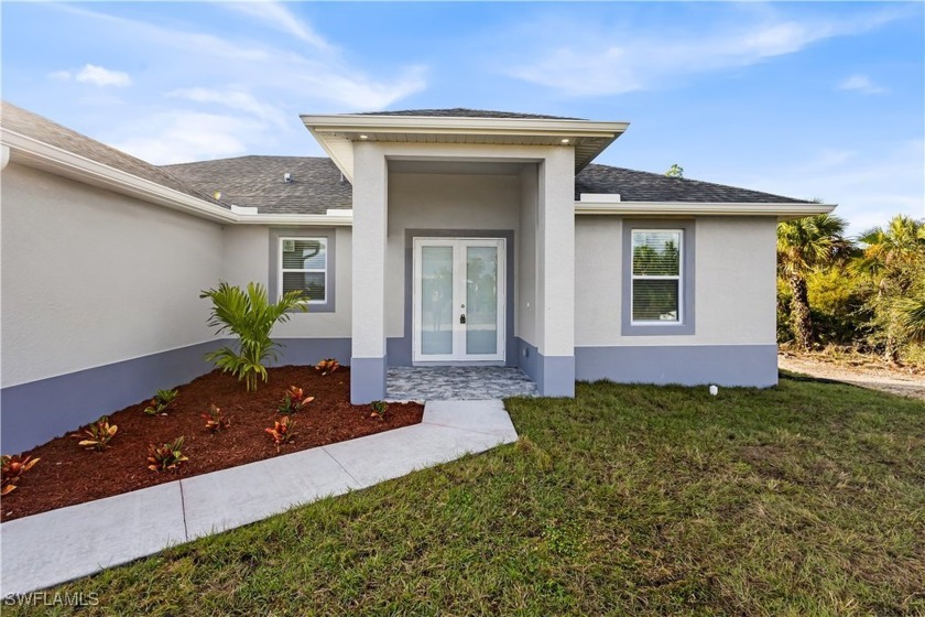 This NEW CONSTRUCTION IS CENTRALLY LOCATED WITH EASY ACCESS TO - Beach Home for sale in Lehigh Acres, Florida on Beachhouse.com