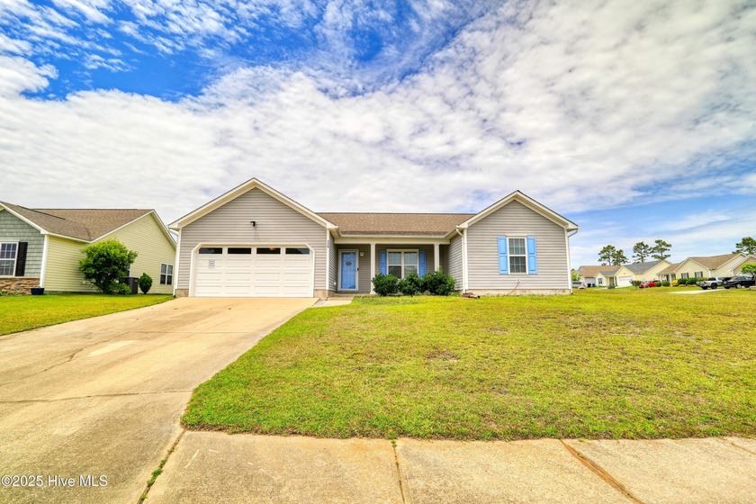 Welcome to 229 Red Carnation Drive! Situated on a wide corner - Beach Home for sale in Holly Ridge, North Carolina on Beachhouse.com