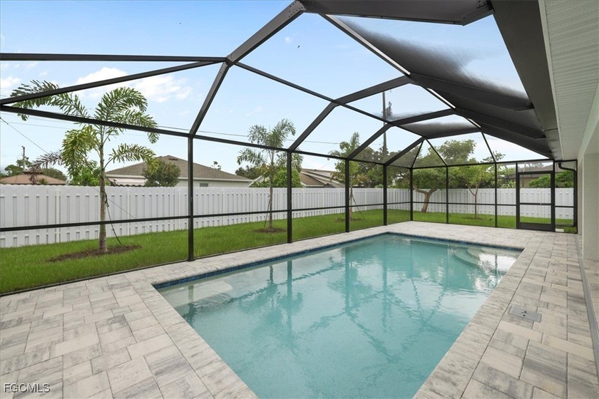 NEW FENCE JUST INSTALLED! SPACIOUS POOL HOME WITH DUAL PRIMARY - Beach Home for sale in Cape Coral, Florida on Beachhouse.com