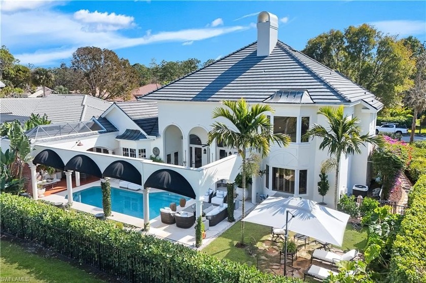 Discover timeless elegance and effortless luxury at 180 Edgemere - Beach Home for sale in Naples, Florida on Beachhouse.com