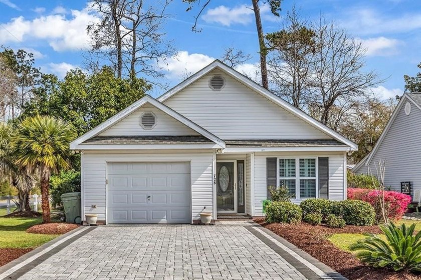 Just a quick 2-minute golf cart ride to the beach, this - Beach Home for sale in Surfside Beach, South Carolina on Beachhouse.com