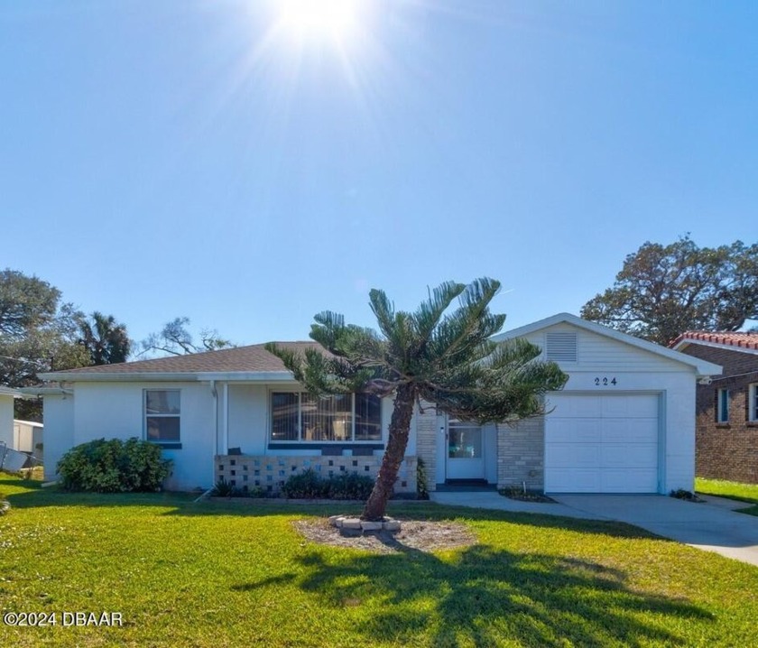 Come see this FURNISHED Beautifully remodeled 3 bedroom 2 bath - Beach Home for sale in Daytona Beach, Florida on Beachhouse.com