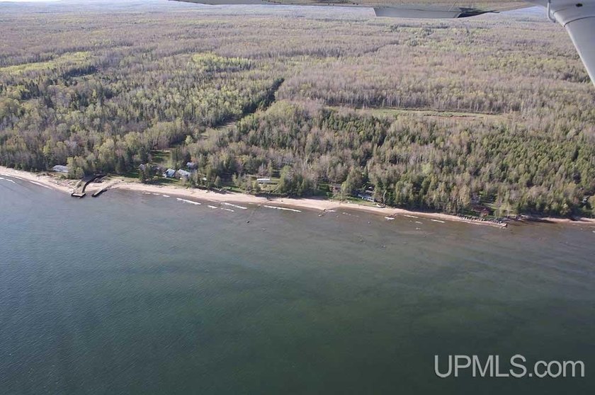LAKE SUPERIOR SAND BEACH FRONTAGE HOME FOR SALE! Located in - Beach Home for sale in Skanee, Michigan on Beachhouse.com