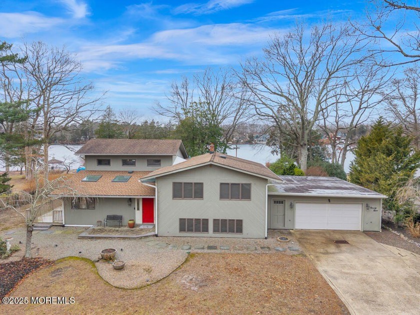 Stunning Lakefront Home. Enjoy serene lake views from your own - Beach Home for sale in Manahawkin, New Jersey on Beachhouse.com