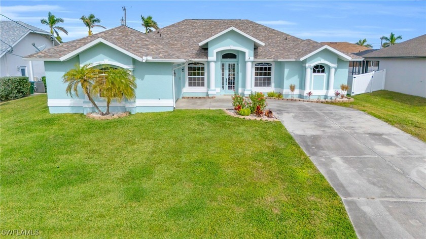 This exceptional TURNKEY residence combines timeless design with - Beach Home for sale in Cape Coral, Florida on Beachhouse.com