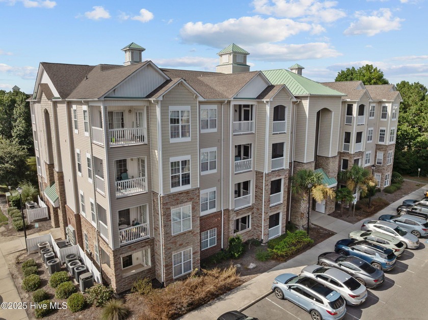 This radiant FIRST LEVEL unit, with two screened in porches was - Beach Condo for sale in Surf City, North Carolina on Beachhouse.com