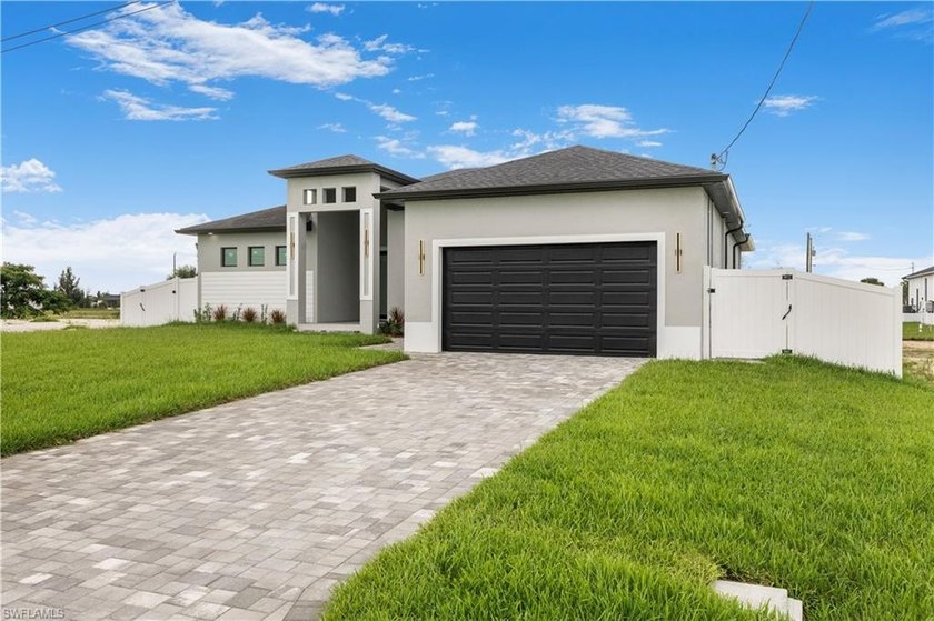 Welcome to a refined residence where design, comfort, and - Beach Home for sale in Cape Coral, Florida on Beachhouse.com