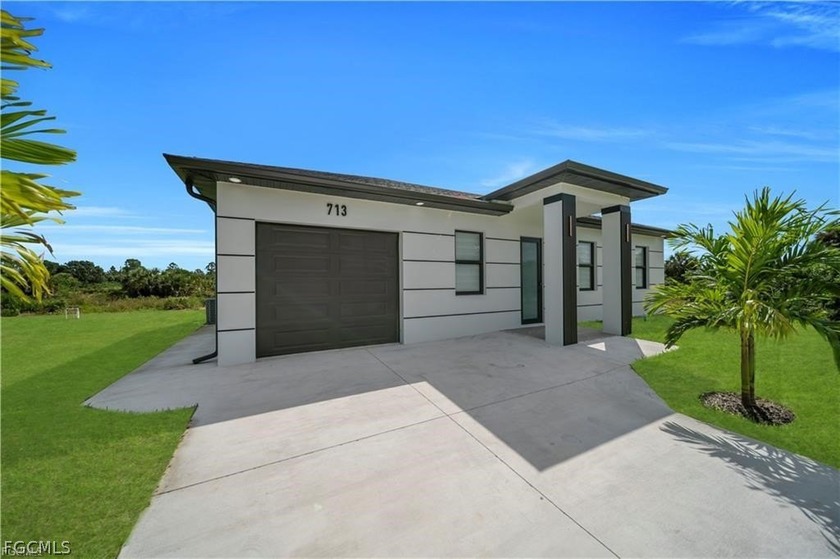 Welcome to your future home, where modern elegance meets - Beach Home for sale in Lehigh Acres, Florida on Beachhouse.com