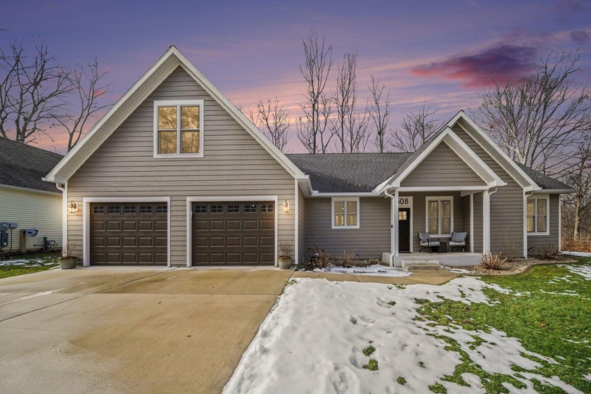 Nestled on a peaceful cul-de-sac, this custom-built home is - Beach Home for sale in New Buffalo, Michigan on Beachhouse.com