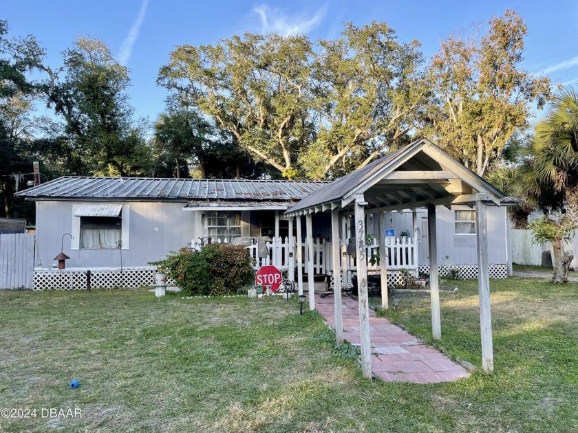 Nestled on generous lot in New Smyrna Beach, with Port Orange - Beach Home for sale in New Smyrna Beach, Florida on Beachhouse.com