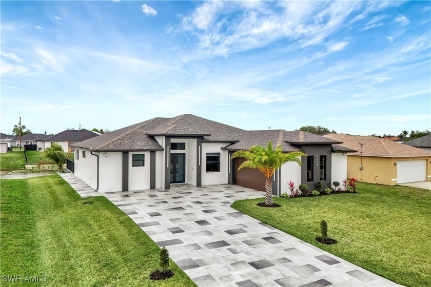 Welcome to your waterfront dream home that shows like a model! - Beach Home for sale in Cape Coral, Florida on Beachhouse.com